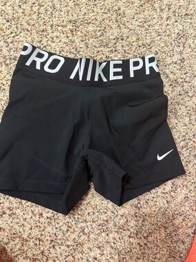 Nike Pro Black Athletic Shorts with White Logo